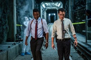Chris Rock as Zeke and Max Minghella as William in Spiral from the book of Saw