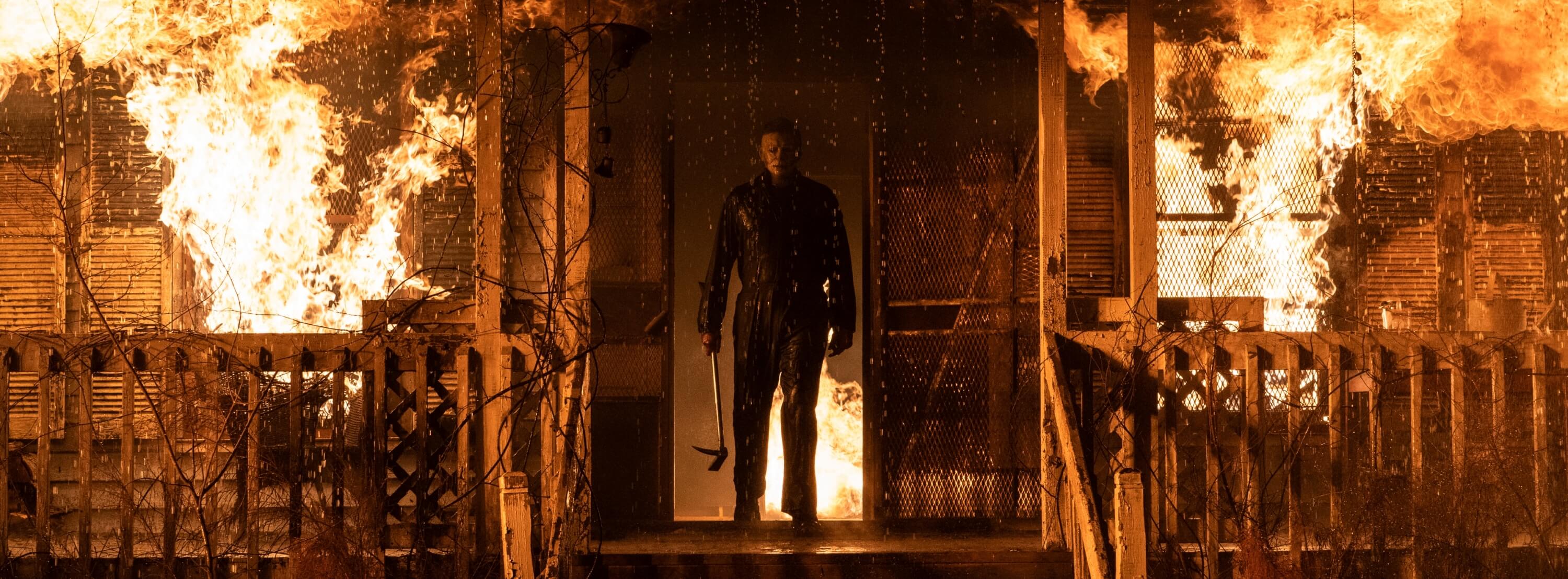 Michael Myers in Laurie Strode's burning house in Halloween Kills Halloween Ends trilogy