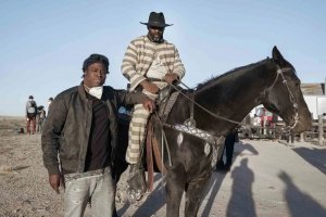 Jeymes Samuel on the set of The Harder They Fall with Idris Elba