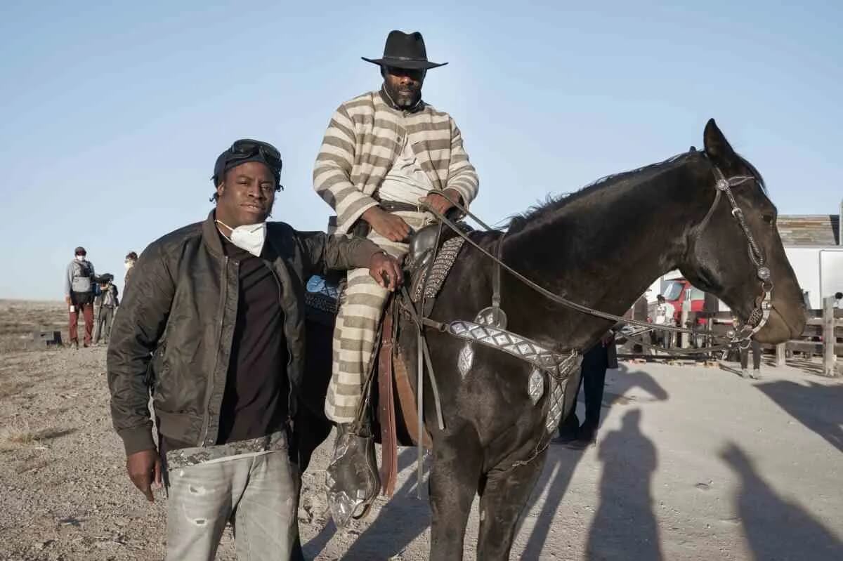 Jeymes Samuel on the set of The Harder They Fall with Idris Elba