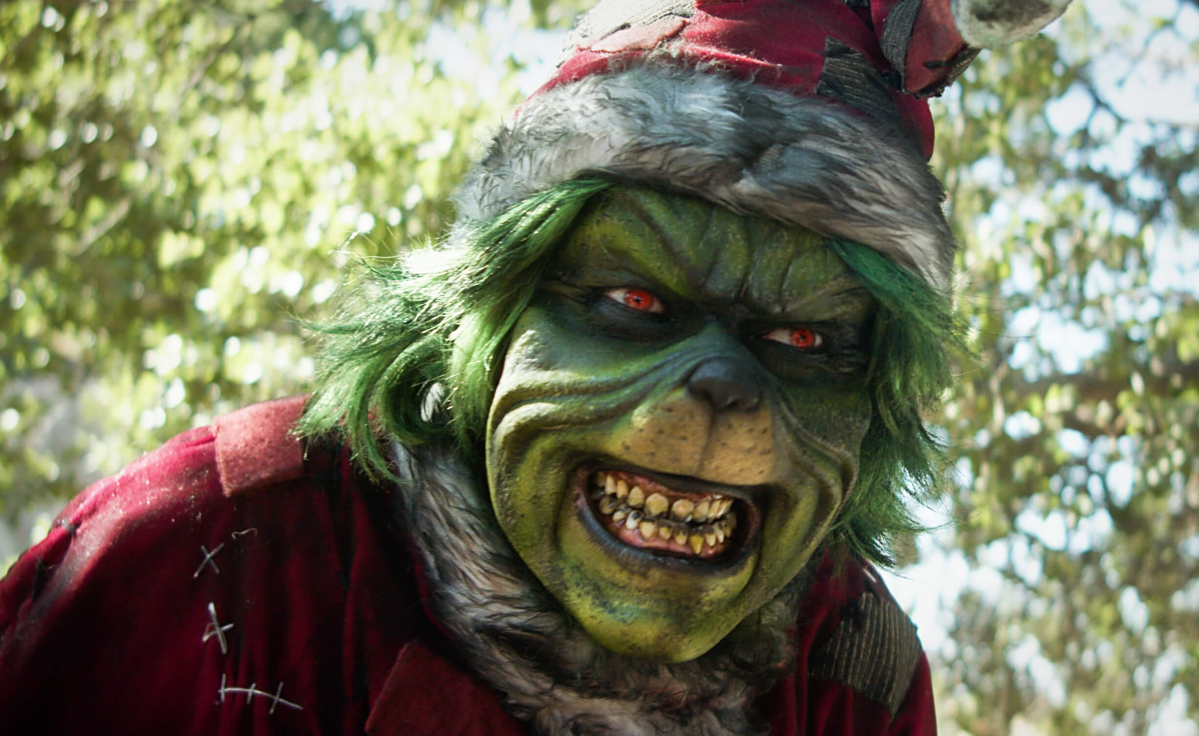 The Mean One (essentially an evil Grinch) grinning maliciously