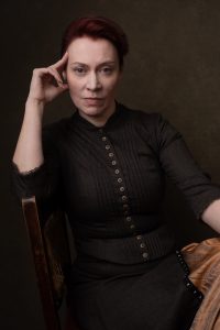 Emily Carding looking thoughtful