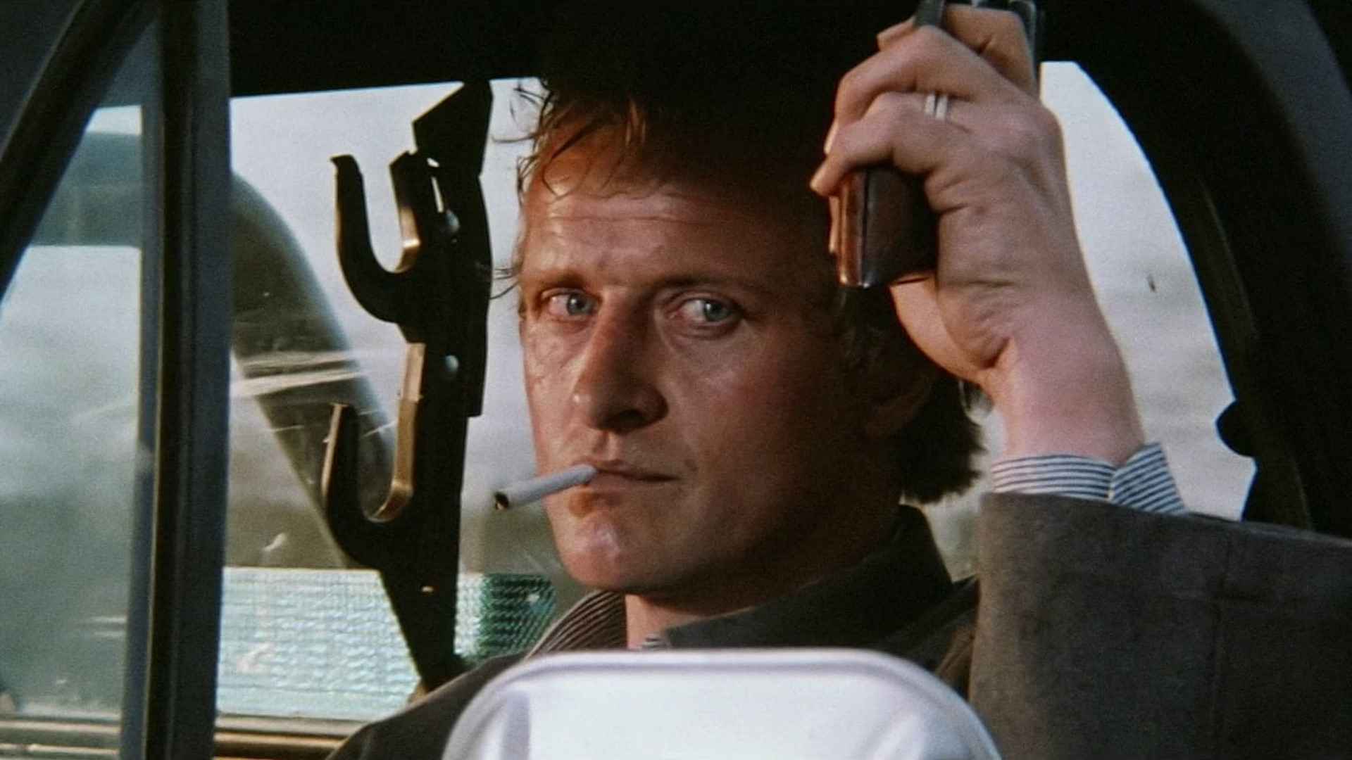 Rutger Hauer in a truck.