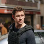john krasinski stars in silent river. image still from jack ryan series