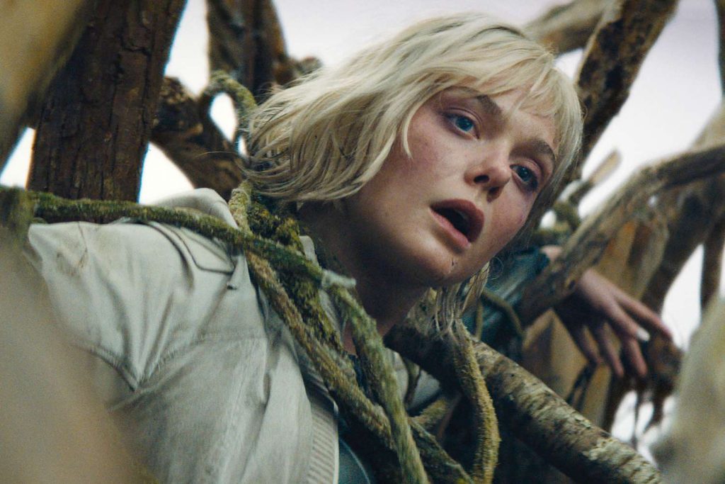 elle fanning in the trailer for predator: badlands