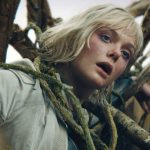 elle fanning in the trailer for predator: badlands