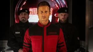 glen powell as ben richards entering the running man competition