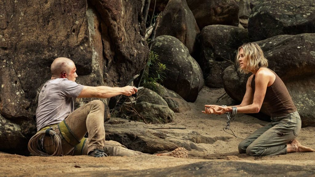 Charlize Theron and Taron Egerton in Apex