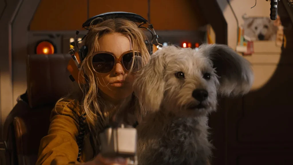 milly alcock as kara and krypto the superdog in supergirl trailer